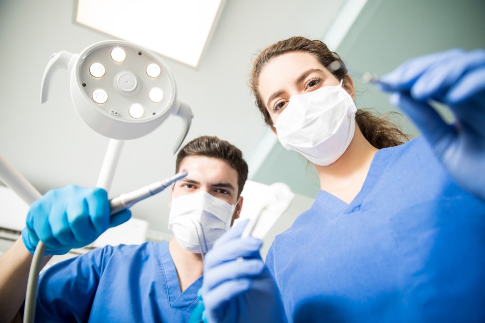 orthodontist operating on a patient